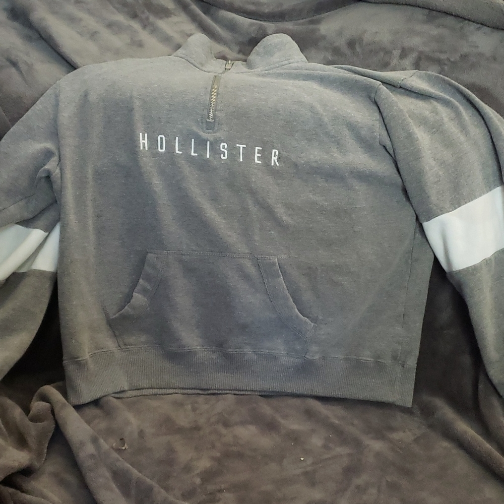I am selling a grey zip up sweater from Hollister